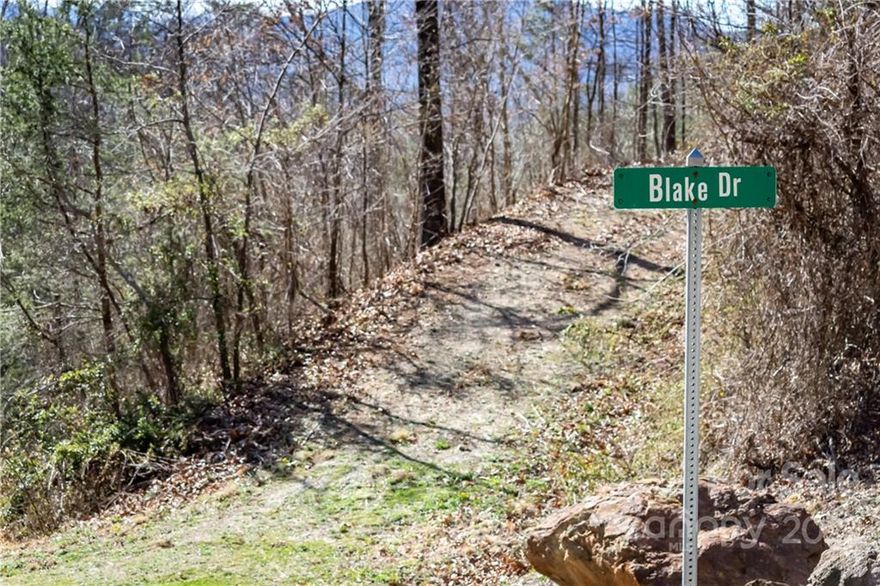 Come see this beautiful 2 acre lot now available in the Grassy Top Estates community right off of Newfound Road. With luxurious year round mountain views and the peace of being in a well kept community, it is the perfect place to build your mountain dream home. The lot has a rough cut in driveway and a house pad already in place, as well as having privately paved and maintained roads for easy access to the property. Enjoy the quiet of the country and the convenience of being close to interstate access. Come walk the property and start planning your mountain home today!