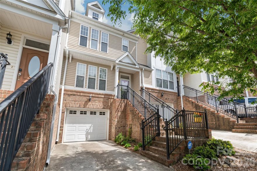 Imagine stepping into your front door and immediately feeling the peace and warmth of your home. That is exactly what 7111 Founders Club Court feels like.  This townhome is located in the Highland Creek community where you are surrounded by lush golf courses, plenty of neighborhood parks, walking trails, sports courts and pools. The home itself features three levels of living space with a garage and bonus room on the first level with a walkout patio; the main level features a flowing layout with a living room, formal dining room, kitchen, and a private deck with retractable screens and views of the golf course; the third level features three bedrooms, including the primary suite (walk-in closet, double vanity and shower only bathroom) and an full additional bathroom. The current owner has replaced all the carpeting upstairs as well as the hickory hardwood floors on the main level, HVAC unit (2022) and the hot water heater (2025).

This home is conveniently located at the border of Charlotte and Concord making your commute super easy and your lifestyle amenities very close. Access to I-485 and I-85 are less than 7 mins away. Lowe’s, Walmart, Concord Mills are less than 5 mins away.  Schedule your private tour today and imagine yourself in your new home, 7111 Founders Club Court.