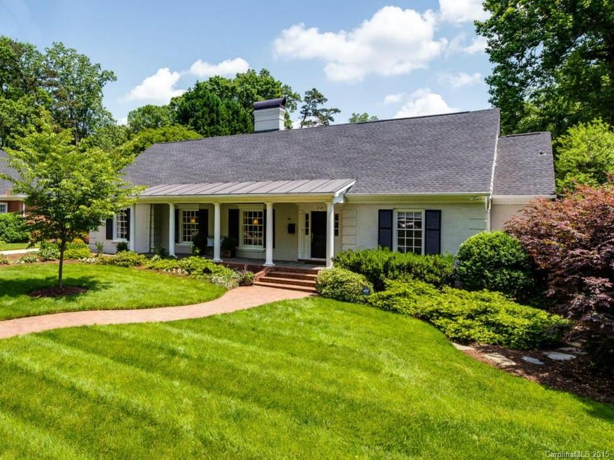 Exquisite 1.5 sty painted brick charmer w/covered porches on a most desirable Charlotte street. Spacious gourmet KT w/vaulted ceiling, Sub-Zero, Wolf, Fisher Paykel and KitchenAid appls.  Mstr on main w/fireplace, sitting & travertine bath. Spacious Formals, Family rm, Study & Guest suite complete 1st floor living areas.  2 add'l BRs, updated full bath, walk-in attic storage (future expansion possible) are up.  Enjoy outdoors under porches & 2 patios.  4 car tandem garage w/ a double door.