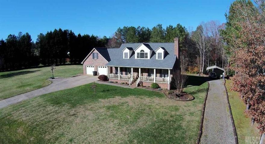 Amazing full brick story & half, 3BR/2.5BA home moments from the marina. Professionally manicured landscaping. Step on up to the covered porch leading into the grand foyer. Brick fireplace in living area will be a delight during the cool season. All amenities are on the main and guest quarters are on the upper level. Remodeling has been completed and consists of stainless steel app., freshly installed granite countertop, hardwoods and a stacked rock fireplace. Tons of room for parking and outdoor entertaining.