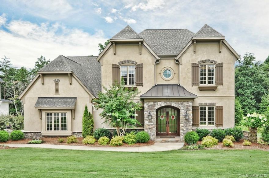 Beautiful Simonini built stone & stucco home with golf course view. Gracious entry with formal dining room, comfortable living room or office. Hardwood flooring throughout main including master bedroom. The kitchen, breakfast and great room share an ideal entertaining area. The kitchen features a large granite kitchen island. Bead board ceilings highlight the kitchen and breakfast area. First level master features alcove sitting area, large master bath with separate vanities and soaking tub.