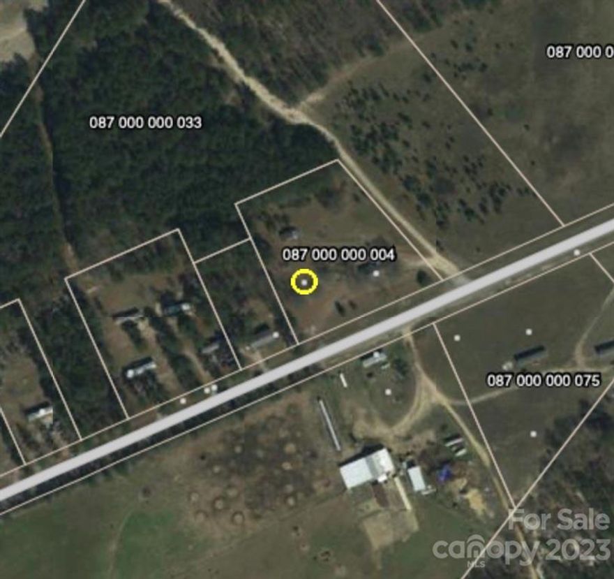 Hard to find lot for manufactured home, cleared, county water, ready for your home.
