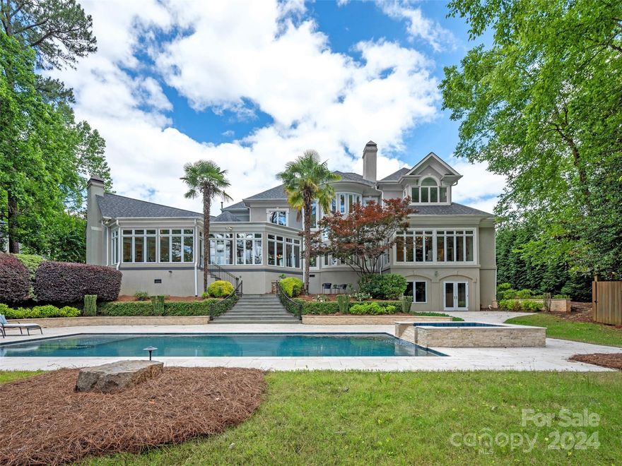 Renovations are complete and the makeover is just stunning! Located in the prestigious Glynmoor Lakes section of Piper Glen, this gorgeous custom home sits on almost 1 acre, waterfront lot with beautiful, mature landscaping. Enter to a grand foyer where you will be wowed by the 3 story wall of windows! Primary Bedroom with a beautifully renovated bath on the main level with adjacent sun room/office overlooking a sparkling saltwater pool. A more casual feel awaits you thru the formal dining room and features a huge Family Room, breakfast, all open to the cook's kitchen with huge island, Refrigerator(new) and Thermador gas cooktop(new), double Thermador ovens, 2 dishwashers, walk-in pantry. Original flooring has been refinished, all new light fixtures, fresh paint throughout. Upstairs are 3 large bedrooms plus a bonus/theatre room and flex space perfect for an office, 2 homework areas. Elevator goes from the sunroom down to a cute pool room/full bath.