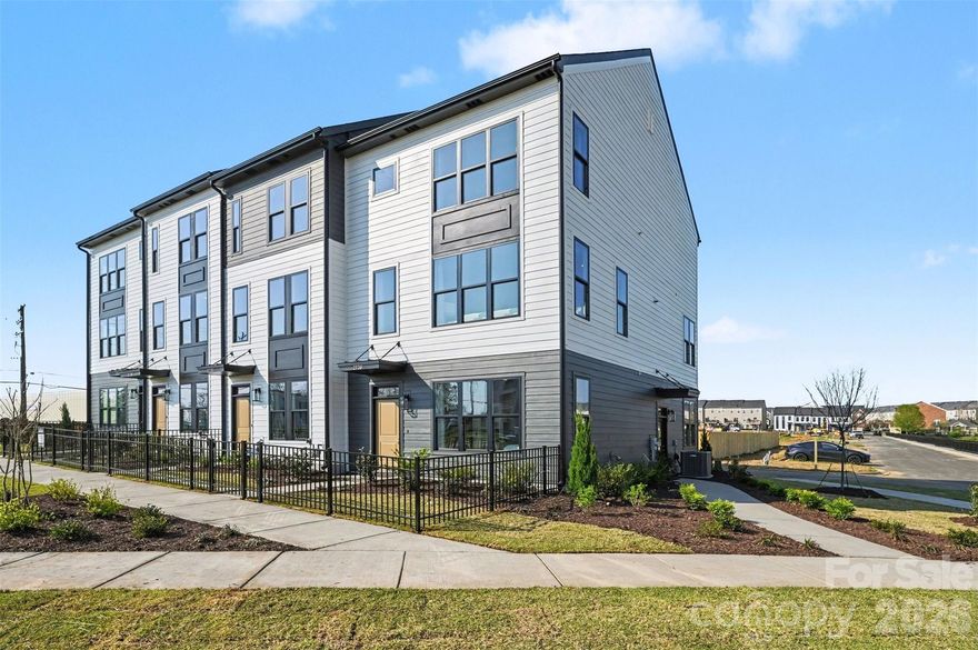 MOVE-IN READY. Discover refined, low-maintenance living at The Greens at Ayrsley, where new construction meets one of Southwest Charlotte’s most walkable and vibrant destinations. Just outside your door, enjoy a connected lifestyle with restaurants, coffee shops, fitness studios, entertainment, and everyday conveniences all within easy reach.
The Charlestown plan offers three levels of flexible living designed for how you live today. The entry level features a private guest suite with full bath, ideal for visitors, a home office, or additional living space, along with a spacious two-car rear-load garage. Upstairs, the main living level unfolds into an open, light-filled space where the kitchen, dining, and living areas come together seamlessly. A generous island anchors the kitchen, while access to a private balcony adds an effortless indoor-outdoor connection.
The upper level is dedicated to rest and retreat, featuring a well-appointed primary suite with a large walk-in closet and thoughtfully designed bath, along with an additional bedroom and full bath for family or guests. Throughout the home, clean lines and timeless finishes create a comfortable, elevated feel.
Located just minutes from major highways, you’ll have quick access to the greater Charlotte area while enjoying the ease of a truly walkable neighborhood.
Backed by a 2-10 Home Warranty. Ask about available down payment assistance through preferred lenders and experience life at Ayrsley.