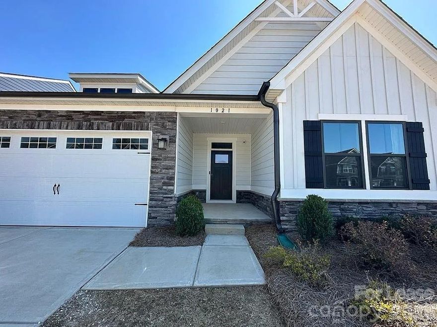 Beautiful Former Model Home for Rent Prime Union County Location. Welcome home to this stunning 1.5-story former model home located in sought-after Union County, perfectly positioned near Indian Trail, Waxhaw, Matthews, and South Charlotte. 
This generous single-family home features a stylish, thoughtfully designed interior and sits on a wooded homesite with included lawn maintenance for easy living. The dream kitchen offers a large eat-at island and walk-in pantry, flowing seamlessly into the open dining area and spacious great room ideal for entertaining. 
Upstairs, you'll find a secluded bedroom with walk-in closets and a functional loft that's perfect for movie nights, a home office, or a game room. The Moore Farm community features miles of natural walking trails along with a charming Farmhouse-style clubhouse and pool, offering comfort, convenience, and recreation all in one exceptional location.