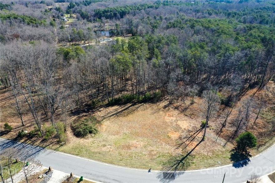 This mostly cleared lot is located in the beautiful all brick subdivision of MountainView Estates within the Faith city limits. City water available, perc test completed and approved for your up to four bedroom dream home. Enjoy a country mountain feel while being minutes from Faith, Granite Quarry, Rockwell, and Salisbury. Lot is .56 acres, mostly cleared, mostly flat, slopes towards the rear property which could potentially work well for a basement home. Parcel ID for Rowan County GIS lookup is 353I072. No HOA, there are CCRs tied to the land including all brick structure, and square footage restrictions. See realtor for details and copy of CCR, Septic Permit, etc.