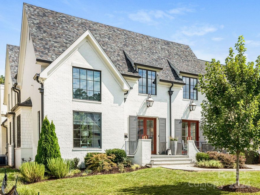 Custom built home in desirable Myers Park. High end features throughout. Grand 2 story foyer w/ paneling. Cozy study w/ high ceilings & built-ins. Spacious Primary on main. Large walk-in closet. Luxurious bath featuring soaking tub, dual vanities w/ quartz countertops, oversized shower w/multiple shower heads & wrought iron double door. Dining room w/ lovely light fixture, mirrored built-ins & designer wallpaper. Bar equipt w/wine cooler & beverage refrigerator. Enclosed scullery w/ ample storage. Light filled kitchen w/white cabinets, quartzite countertops, island accomodates seating for 6, Blue Star gas range w/ double oven & pot filler, Sub-zero refrig. Breakfast area complete w/ built in bench . Family room adorned w/ beamed ceiling, fireplace & built-ins. Doors open to covered terrace w/ fireplace overlooking backyard. Mud room with 4 lockers and laundry. 3br/3bt plus bonus on 2nd flr. 3rd has br/bath. 2 car garage with apartment above. Greenway, shopping , restaurants nearby.