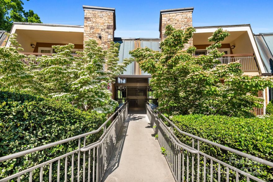 Resort-style living in the heart of Asheville! This fully furnished, ADA-compliant 2BR/2BA condo is located in The Residences at Biltmore, minutes from Biltmore Village and downtown. This unit features hardwood floors, granite countertops, a stacked stone gas fireplace, stainless steel appliances, and a private, lush patio accessible from both the living area and primary suite. Premium On-site amenities including a pool & hot tub, fitness center, firepit, and a restaurant & bar. Participate in the onsite rental program for turn-key investment income, or enjoy it as a second home or full-time residence. Experience upscale mountain living with all the convenience of a lock-and-leave lifestyle.