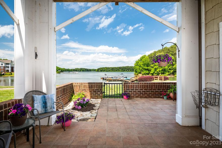 Welcome to 860 Jetton Street #58 of Spinnaker Point. This home is truly move in ready...new paint, new flooring, designer lighting and so much more. This special ground level walk out unit offers panoramic views of the tranquil Lake Davidson that is conveniently accessible from your lakeside courtyard. Spinnaker Point includes lake access, lakeside pool, paddle sport launch, tennis courts, and a book exchange station. A scenic walk to downtown Davidson which offers great dining, shopping and boutique fitness facilities. This waterfront unit presents an exceptional opportunity to enjoy outdoor activities including kayaking, rowing, fishing or swimming. Immerse yourself in the abundant wildlife including blue herons, bald eagles, turtles and so much more that can be spotted on the serene shores of Lake Davidson.