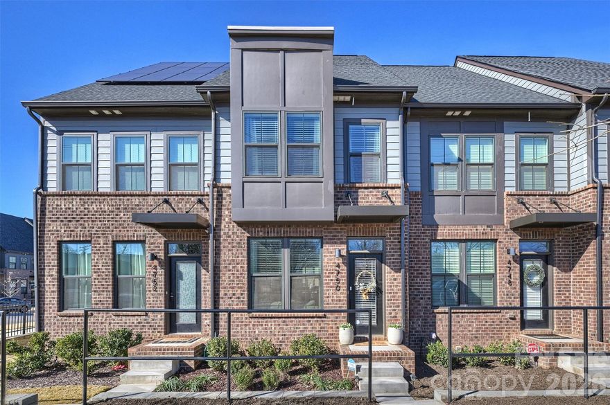 Welcome home to 4750 Chastain Avenue — a modern, like-new townhome in Charlotte’s sought-after LoSo neighborhood. Built in 2022, this stylish residence offers contemporary design, thoughtful layout, and exceptional access to South End, Uptown, and the light rail. The main level features a bright, open living room that flows seamlessly into the kitchen, ideal for both entertaining and everyday living. The kitchen showcases crisp white cabinetry, stainless steel appliances, and a large center island, along with a dedicated dine-in area. Just off the rear, a private balcony provides the perfect spot for grilling or enjoying fresh air. Upstairs, the spacious primary suite serves as a true retreat with an en-suite bathroom and a large walk-in closet. The second bedroom also features its own en-suite bathroom, offering comfort and privacy for guests or roommates. The third level adds exceptional flexibility with a third bedroom or flex space, a third full bath, and direct access to the home’s standout feature — a private rooftop terrace with stunning Charlotte skyline views, ideal for relaxing, entertaining, or enjoying city sunsets. Additional highlights include a 2-car tandem garage, additional street parking along Chastain Avenue for guests, and modern finishes throughout. Move-in ready and beautifully maintained, this townhome delivers the very best of urban living in one of Charlotte’s most vibrant neighborhoods.