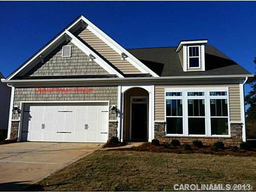 Awesome Ranch Plan! Over sized Kitchen Island. Gourmet Kitchen with Gas cook top, Double Ovens, Granite, Stainless Appliances and Hardwoods.