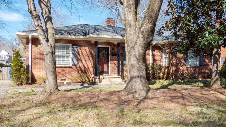 Charming 3 bedroom 1 bath full brick home close to Mooresville's Downtown.  You are greeted at the front door with beautiful Hardwoods that extend through the great room, Dining Room & Bedrooms. A large Dining Room featuring incredible builtins great for storage. Cozy great room with fireplace. Kitchen with newer cabinets, granite countertops, SS appliances and tile floor.  All bedrooms are a good size, Primary bedroom has 2 separate closets. Full bath has tub/shower combo. A good size backyard completely fenced with flagstone patio for entertaining.
Basement has good space for extra storage &  laundry area.  There is a stairway leading outside from the basement.  Fireplace has never been used and sold as is.  Tenant in home and will need 24 hour notice before showing.  TENANT'S MOVING OUT MAY 31!