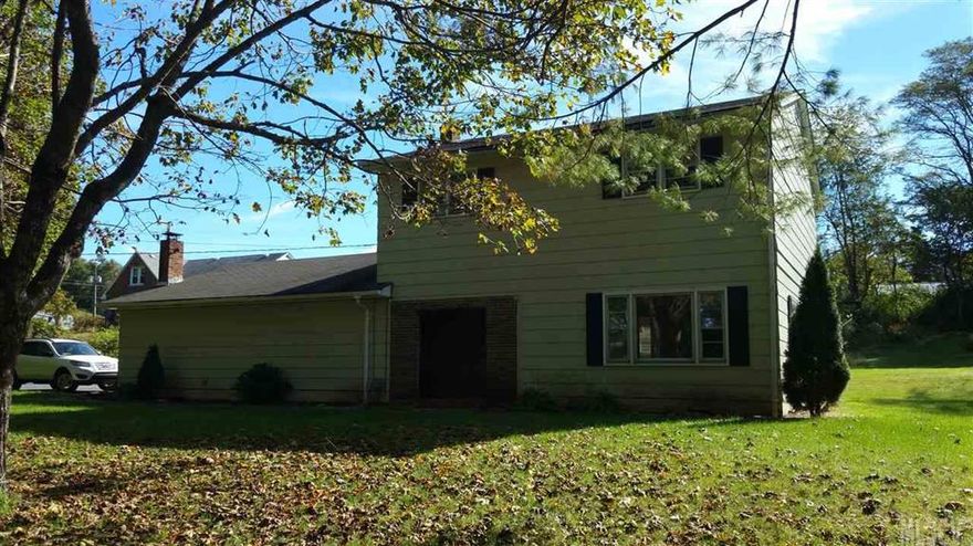 Foreclosed 4 BR home very close to Boone and ASU - less than five minute drive away from Boone. Large, traditional home with garage, bonus room, lovely yard, paved drive. Almost 2700 sq.ft. under roof, including garage. Quick access to shopping, all schools, town center, university, hospital, dog park, soccer complex and Rocky Mountain Bike Park. Short drive to Blue Ridge Parkway and ski slopes in Blowing Rock.  Property adjoins acreage tract and has mountain views. Spacious bedrooms and closets. Bonus room heat source was wood burning stove which has been removed - bonus room was counted in heated square footage. Needs extensive updating and repairs. Pre-qual or proof of funds needed with offer. Sold AS IS. May not qualify for high LTV financing - might qualify for FHA 203K or purchase/construction loan.