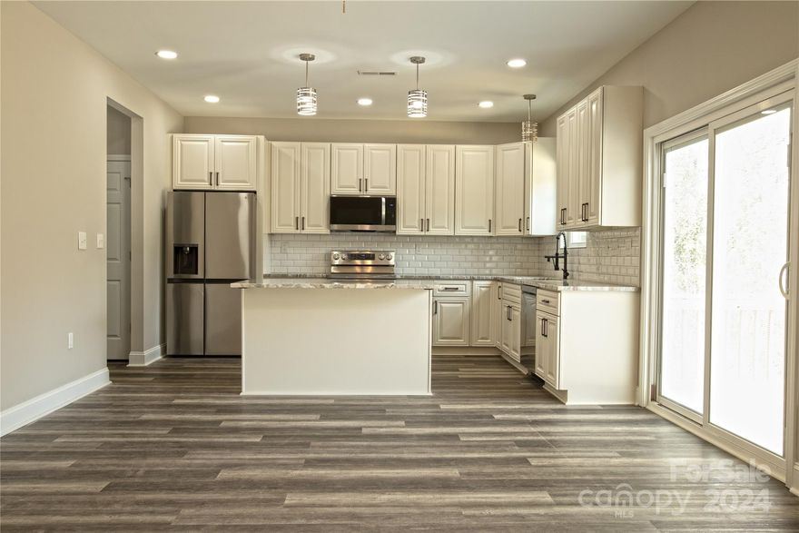 PRICE REDUCED!!!Discover more than just a home!! 423 Blake Street Rock Hill is it!!! This beautiful 3 bedroom, 2 1/2 bath home is nestled in the South Pointe High School zone! The primary bedroom is generously sized, with a lovely, designed bathroom with a spacious closet. Did I mention NO CARPET!!!!! Laminated Wood throughout and Wood stairs!!! Builder is offering a Builder's Warranty!!Perfect location with close proximity to schools, shopping, restaurants and Interstate 77. Home may qualify for special financing. Call for your tour today.