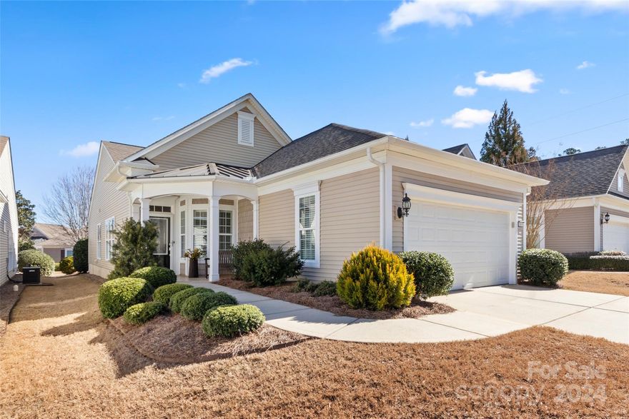 Well-maintained Pine Spring home w/ a sunroom, patio with privacy landscaping, & lots of upgrades! HVAC new 2021, office w/ plantation shutters on the windows, crown molding throughout, updated mirrors & fixtures, floored attic storage 1-yr old carpet in the bedrooms, & beaming natural light! The kitchen at the rear of the home boasts SS appliances (smart GE range ~1yr), granite counters, white cabinets, beautiful tile backsplash, cabinet roll-outs, recessed lighting, a double door pantry, & a breakfast nook! A lovely sunroom w/ shiplap ceiling & wood blinds leads out to the paver patio. With the privacy landscaping, it's a great spot to soak up some sun or host family & friends! The primary bedroom has an en-suite bath w/ a dual sink vanity, frameless glass shower door, & a walk-in closet. The guest bedroom & hallway bath are perfect for out of town visitors. Don't wait to come join the active-adult lifestyle of Sun City & enjoy resort style amenities every day!