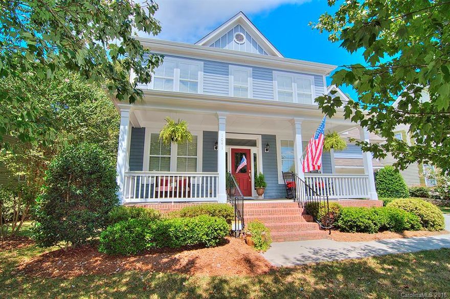 Gorgeous 2 story with rocking chair front porch in Tega Cay. Upper & lower decks w ceiling fans. Kitchen with granite counters, custom tile backsplash, & 42" maple cabinets with pull out drawers. Great room with gas logs in fireplace. Spacious master bedroom has private covered deck overlooking golf course. Master bath has double vanities and separate shower/tub. Additional bedrooms with jack n jill bath. Large bed/bonus for 4th bedroom. Plenty of attic storage. Fenced yard. Fort Mill schools.