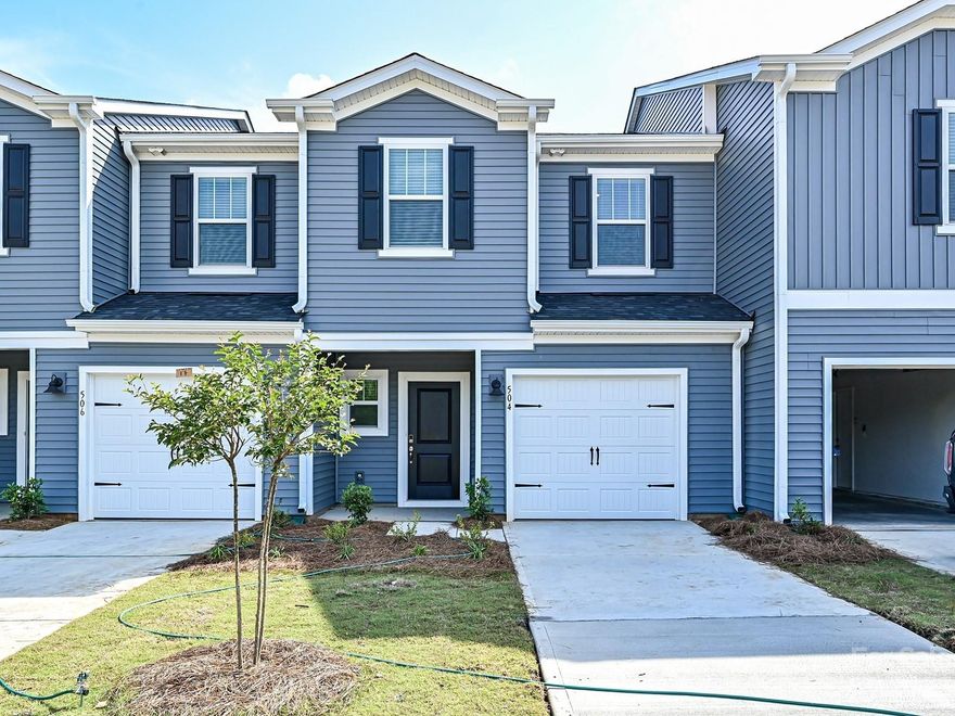 Brand new, energy-efficient home available NOW! Prep dinner at the kitchen island while mingling with guests in the open-concept area. Convenient upstairs laundry simplifies the chores. Linen cabinets, smoky grey granite countertops, grey cool-tone EVP flooring, textured carpet in our Cool package. Ashe Downs brings low-maintenance, energy-efficient townhomes to desirable Fort Mill, SC starting at the $300s. Whether you're enjoying date night at Kingsley, exploring local breweries in downtown Fort Mill or shopping the latest trends at Baxter Village, there's no shortage of things to do. With I-77 and I-485 just minutes away, enjoy easy commutes to Uptown Charlotte, Ballantyne and highly rated York County schools. Schedule a tour today.  Each of our homes is built with innovative, energy-efficient features designed to help you enjoy more savings, better health, real comfort and peace of mind.