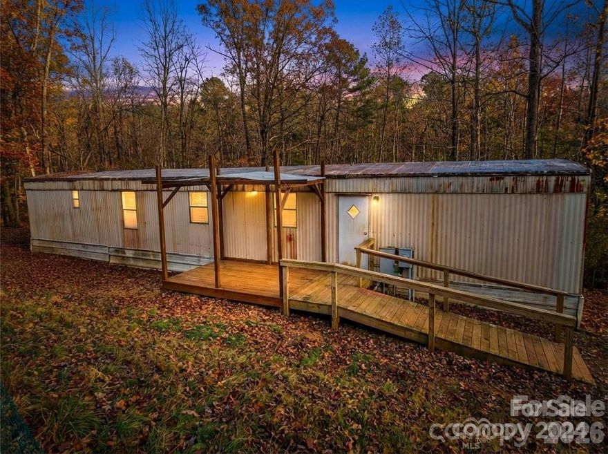 Tucked away at the end of a private road, this 3-bedroom, 1.5-bath manufactured home sits on a peaceful 1.1-acre parcel offering privacy, space, and opportunity. The home is move-in ready and includes all kitchen appliances, making it easy to settle in right away. While the interior could benefit from some cosmetic updates, it provides a solid and comfortable foundation to make your own.

A true standout feature of this property is the additional serviced site, complete with its own utilities and ready for a second manufactured home, RV, or camper—ideal for multigenerational living, guests, or potential rental income. A creek runs through the property, adding natural beauty and a tranquil setting rarely found.

Whether you’re seeking a private retreat, room to expand, or a property with versatile use potential, this unique offering delivers space, serenity, and endless possibilities.