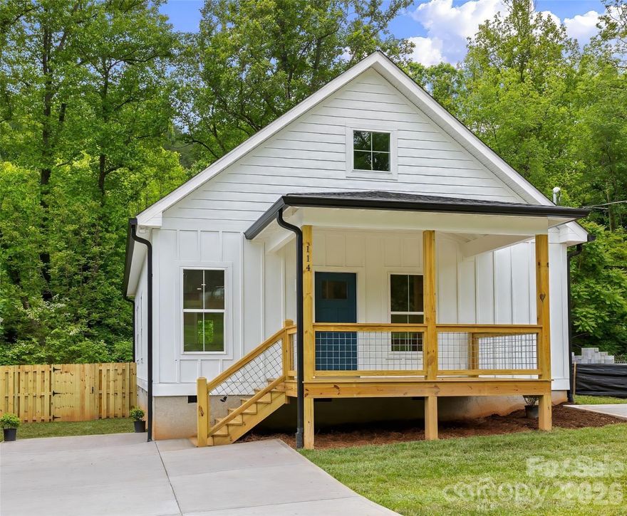 114 Orchard Street Adventure and affordability meet just 20 minutes from Asheville! This newly built 2BR/2BA home in Old Fort puts you steps from trailheads, cycling routes, and local dining and breweries - perfect for active living or a weekend escape. Flexible live/work or small professional use adds versatility beyond a traditional residence. Finished in crisp white board-and-batten, the home features a functional layout, city water/sewer, covered front porch, back deck, stand-up attic, privacy fence, and dual off-street parking. A charming small stream adds natural ambiance, while the low-maintenance yard keeps life simple. The property also offers short- or mid-term rental potential in a supply-constrained market. Owner/broker.


Exterior highlights include:
Covered front porch
Private back deck
Fully fenced yard
Easy-care, level lot
Large driveway for plenty of parking

Located in the heart of Old Fort, you’re just a short walk or ride to local restaurants, breweries, and shops — and only 20 minutes to Asheville.

No HOA. STR-friendly. Broker-owned.
Seller is offering a closing cost allowance with an acceptable offer.