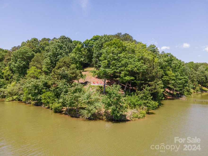 Don't miss out on the opportunity to own an approx. 1.94 acre LAKEFRONT LOT with stunning views of Lake Lookout Shoals. Offering over 435' of shoreline!  Excellent Building Site with awesome long range views! The seller applied/received a septic permit for a 3BR home in 2022. Buyer must apply for well permit & install.  Dock Permit Approval letter has been issued from Duke Energy (see assoc. docs), as well as a survey that was done by Darrin Reid in 2022. This gated community features: boat ramp, daily boat parking, beach, swimming area, picnic shelter, fishing and fenced boat/RV storage. Perfect lot for your dream waterfront home! HOA dues for this property (because it is 1.5 lots) is $646.50/year.
Subdivision Website with other helpful info, restrictions, and photos of the community features: https://lookoutriverwalk.com/