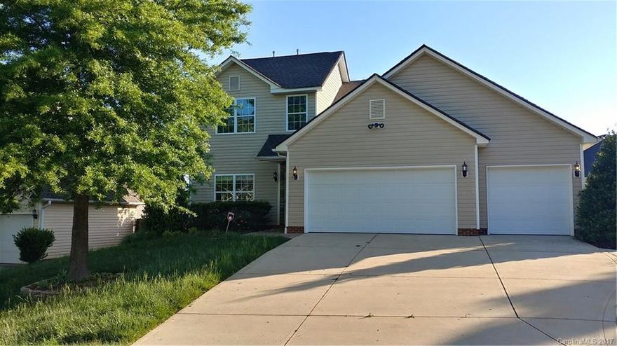 Well maintained and recently updated home, Granite counter tops, tile in bathrooms, master downstairs with garden tub and stand up shower, fireplace in living room, finished 3 car garage, ample natural light in all rooms, in-ground irrigation system in front and back, Fenced yard, community pool and play grounds.