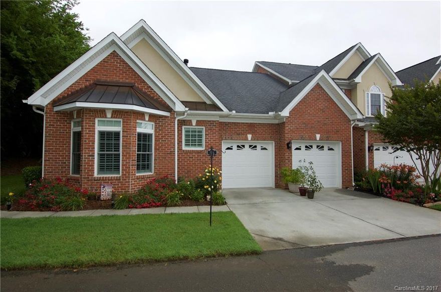 Amazing ranch style town home in a great location! Hardwoods & crown molding throughout the main living areas. Formal dining room to entertain guests. Chefs kitchen w/ intricate tile backsplash, SS appliances, & beautiful cabinetry. Spacious master bedroom luxurious tray ceiling. Master bath boasts a jetted tub & dual vanities. Gorgeous & private patio area. The town home is in spectacular condition & has been well maintained. This will not last long!