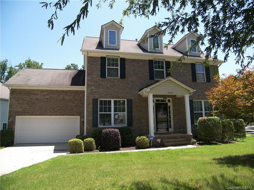 Beautiful 2 story home in amenity rich community of Carrington Ridge. Distinctive corner lot. Open floorplan. Kitch features 42 in cabinets, corian counters. Hardwoods in kitchen, breakfast area, office, dining rm and great rm.  Office with French doors. Large master bedrm with sitting area. Huge 4th BR/Bonus. Spacious deck overlooking large fenced backyard. Community pool, pavilion, playground. Close to schools, shopping and easy access to I-77 and I-485. 4 BR, 2.5 BA, 2,500 SF, 2 Car Garage.