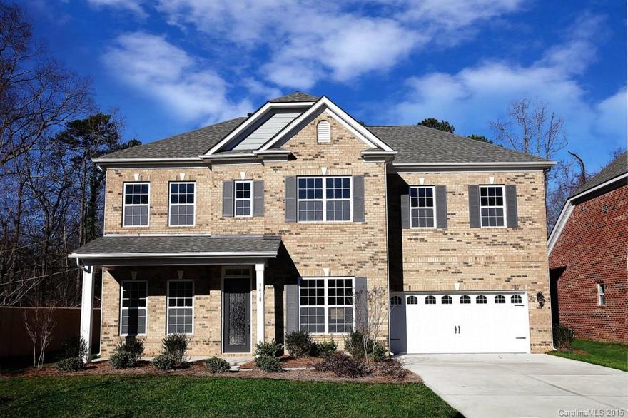 Full Brick 2-story home with a partially finished basement!  Including the basemnt, this expansive home offers 6 bdrms and 3.5 baths.  Gourmet Kitchen with granite countertops, hardwd floors, gas cooktop and separate wall oven. Butler's Pantry plus a big storage pantry!  Formal areas, lg Family Room with Fireplace.  Guest Suite on Main.  Bedroom, powder room, and bonus living area in the basement, plus storage!  Beautiful Owner's Suite with large walk-in and tile bath. Deck w/stairs, plus patio.