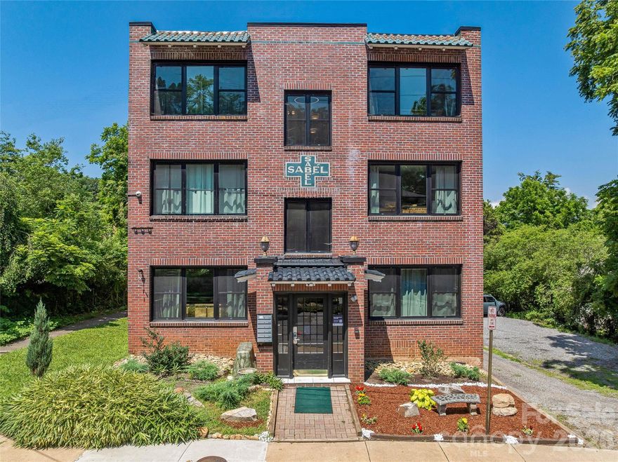 The rarest thing in Asheville’s short-term rental market: a fully licensed, completely renovated multi-unit STR building in the heart of downtown, ready for a great operator to make their mark.

Asheville stopped issuing new short-term rental permits in the urban core. That means 42 Furman Avenue is not just a building — it is one of the only opportunities in the market to acquire a licensed, compliant, income-producing STR portfolio without the permitting risk that makes most comparable deals impossible to execute. You cannot build this asset from scratch. You can only buy it.

The building itself was taken down to the studs and completely rebuilt from the inside out. Every system, every finish, every unit was purpose-built for short-term rental from day one — not retrofitted, not patched together from an old apartment conversion. The result is a 16-unit, 8,395 sq ft brick building spanning three stories plus a walkout basement, positioned less than a mile from the best of downtown Asheville’s dining, arts, and entertainment scene.

The Unit Mix
12 one-bedroom / one-bath units and 4 studio units across the building. Clean, modern interiors with hardwood floors, black-frame windows, and thoughtfully designed layouts that photograph well and generate strong guest reviews.

The Opportunity
This building has never been operated at its full potential. With all 16 units now live and the Asheville tourism market fully recovered from Hurricane Helene, the timing is right for an operator who knows what they’re doing to come in, put their systems to work, and capture what the market is already offering. AirDNA and Rabbu market data consistently show comparable downtown Asheville units achieving $123 to $213 ADR with 70%+ occupancy. The infrastructure is here. The license is here. The demand is here. What this building needs is the right operator behind it.

Why Asheville
Asheville is one of the most consistently high-demand short-term rental markets in the Southeast. A top-tier destination for food, music, outdoor recreation, and year-round tourism, it draws visitors from across the country and commands premium nightly rates. The Blue Ridge Parkway, the Biltmore Estate, the River Arts District, and a nationally recognized culinary scene ensure that demand is not seasonal — it is structural.

The Details
 · 16 licensed STR units (12 one-bed / 4 studio)
 · Fully renovated to the studs — purpose-built for STR
 · 3 stories plus walkout basement
 · ~8,395 sq ft brick construction
 · Active, compliant STR license — one of the very few in downtown Asheville
 · Dedicated parking
 · Offered at $5,499,000

For qualified buyers, a full investor package including unit-level financials, market comp analysis, and stabilized NOI projections is available upon request.