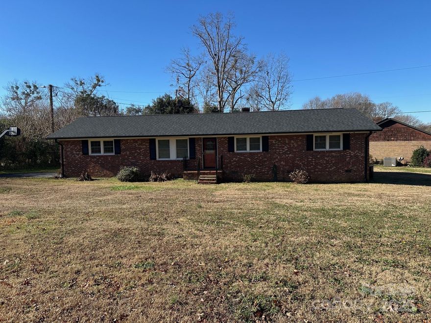 Great 3 bedroom brick home with an attached garage and fenced backyard. Inside features include a gas log fireplace, stainless steel appliances, lots of counter space and cabinets for storage. Property includes a detached garage and a storage building out back. The 20x16 detached garage has a full bathroom and walk-in closet and was previously used as second living quarters. This home is minutes away from I-85 and is conveniently located to shopping, restaurants and entertainment. Don't miss out, schedule your showing today.