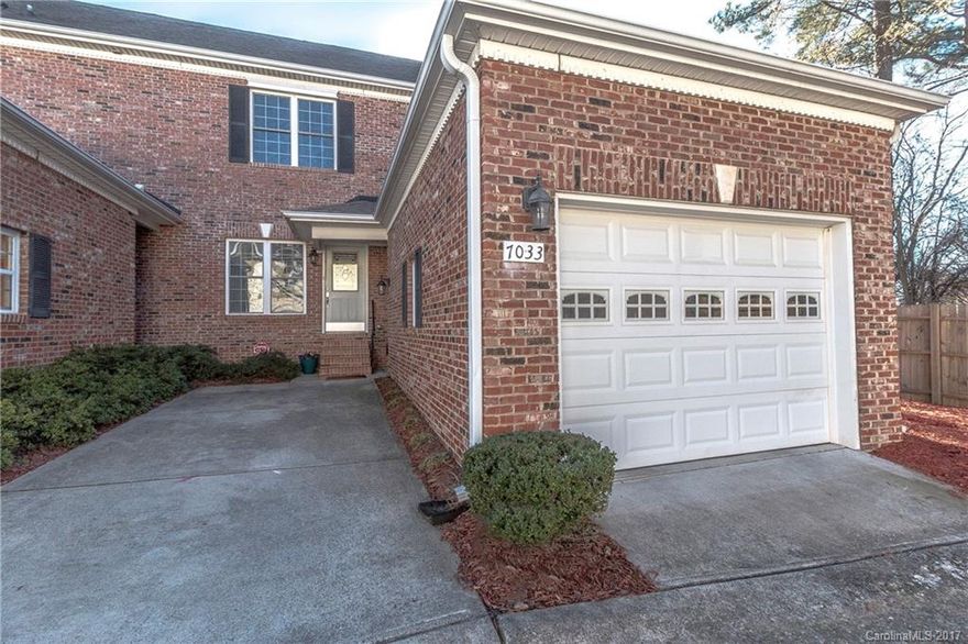 This place looks like it's out of a magazine. Front room (used as dining) wows w/designer lighting, fireplace & built-ins. Kitchen w/ travertine countertops, glass tile backsplash & spacious island. Back room (used as living) could also be dining or add doors & create bedroom 3. Ample storage & full bath on main. Upstairs has another bed, bath, laundry & roomy owner's suite w/ spa-like bath & BIG walk-in. 1-car garage, plus parking pad. End unit/near guest spots. Complex has pool. Welcome home!