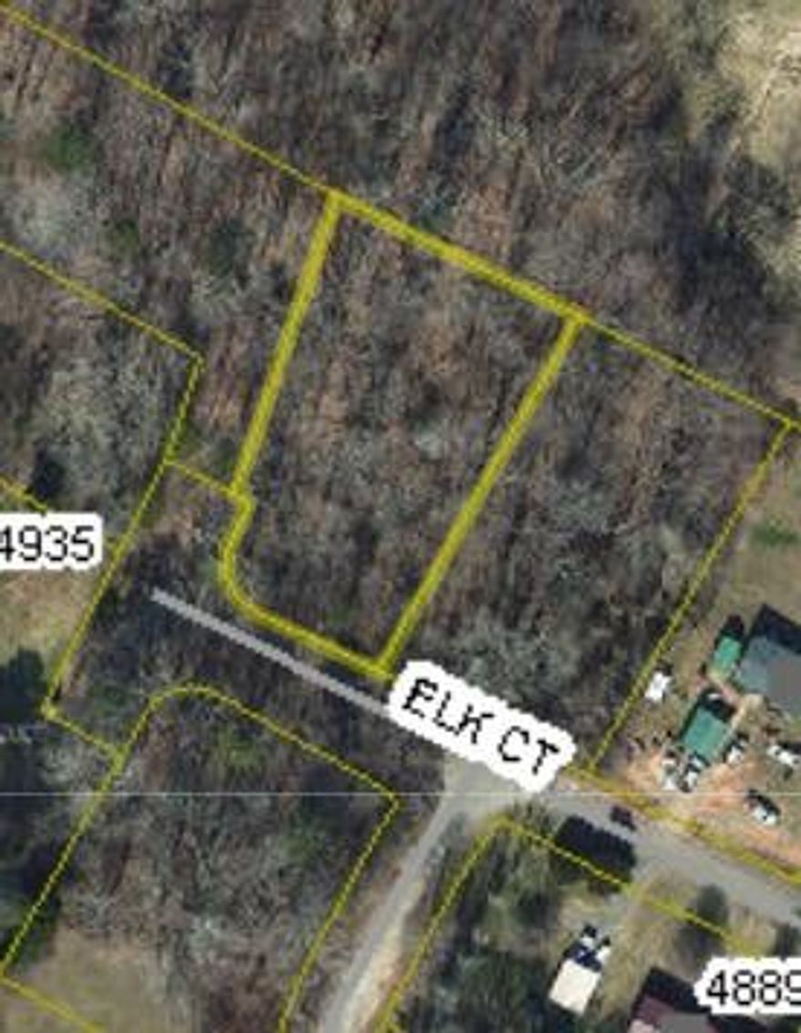 Land Lot suitable for Doublewide, Modular, and Site built homes. County water available, septic needed. Light restrictions, includes dwelling minimum 1100sq ft.