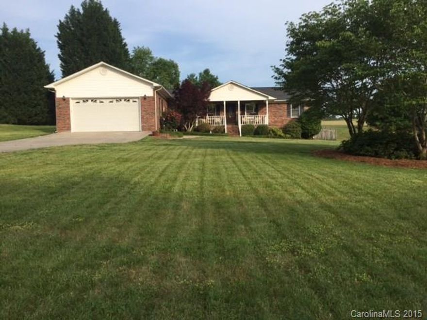 Great Home.  Two casual living areas, formal dining room, 3 bedrooms and 21/2 baths.  Well maintained with fenced back yard on Wood Bridge golf course - Seasonal lake views