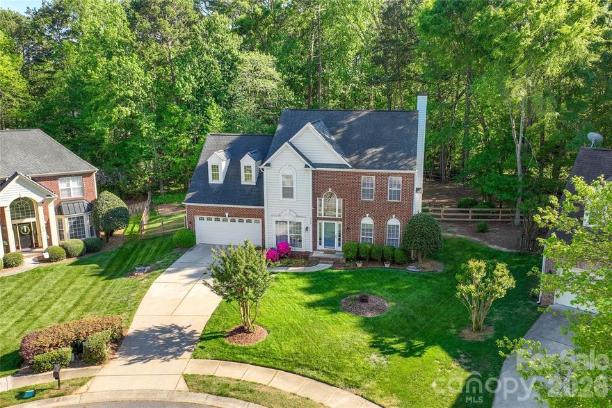 **Showings begin Thursday 4/23.**Easily walkable to Matthews Elementary, tons of restaurants, greenways, parks and all the festivals that Matthews offers. Minutes to I- 485, Target, Costco, the Mecklenburg County Sportsplex and numerous greenway access points. The house is owned by a former real estate agent so the attention to detail and maintenance shows. One of the best lots in the Matthews Estates neighborhood. The home sits on massive private cul-de-sac lot that measures .46 acres. Buy with peace of mind - recent tree work was completed to remove any dead trees, consistent semi-annual service on the HVAC units and a transferable termite bond. Easy, low maintenance backyard - the owners installed artificial turf years ago and it still looks brand new. Don’t miss the oversized garage, EV charger outlet and the massive owner’s closet.