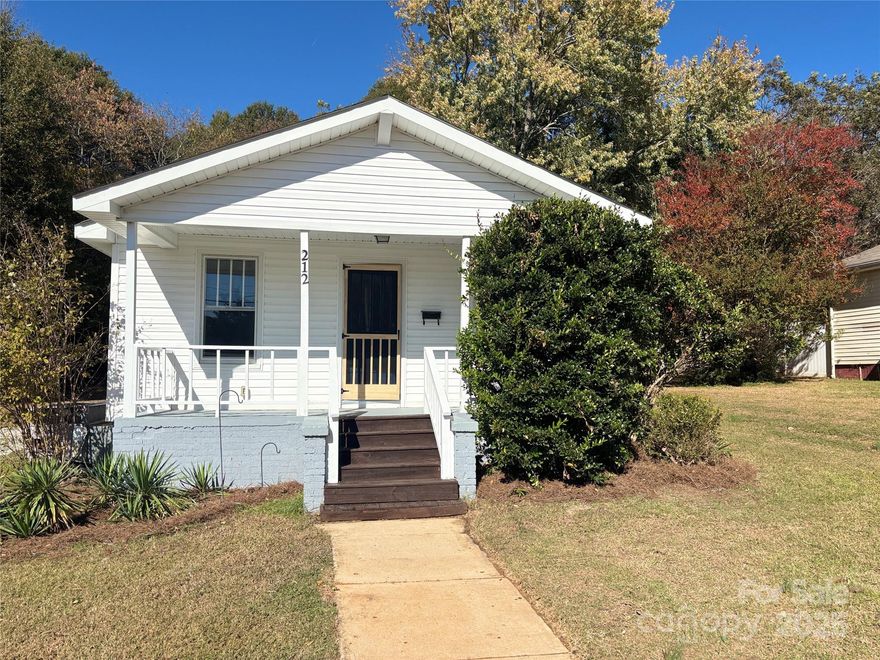 Charming 1930s cottage style home in the heart of Kannapolis. Close to shopping, dining, the Kannonballers Stadium, Laureate Center and the infamous Gem Theater. The front porch welcomes you with a classic southern swing.  Inside you will find restored original hardwood floors throughout most of the house and tile in the kitchen Off the kitchen is the laundry area and the back door leading to a large wood deck.
