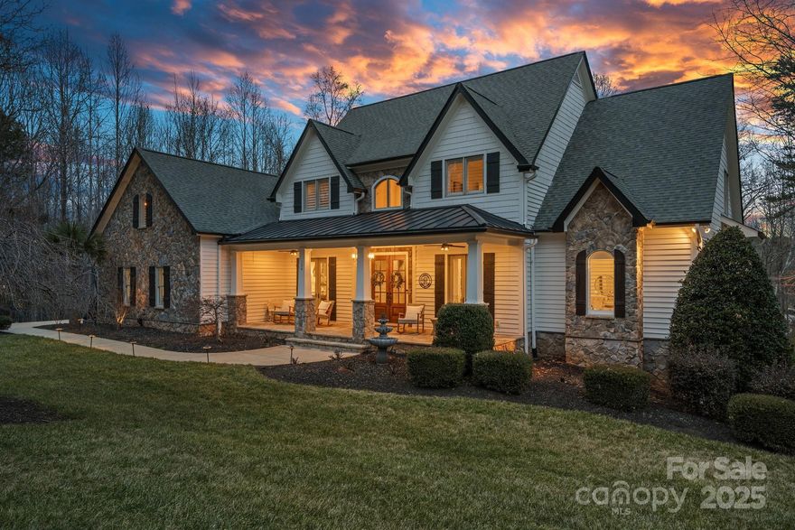 Welcome to 134 Wild Harbor, where luxury meets comfort in the sought after neighborhood of The Point! This home boasts extensive upgrades and has been meticulously maintained. The open-concept kitchen and living areas exude natural light, complimented by a formal dining room with a coffered ceiling and an office with French doors opening to a spacious front porch. The gourmet kitchen includes granite countertops, coffee bar, and a walk-in pantry, with a cozy breakfast nook offering lake views. The main floor primary suite includes dual walk-in closets and a luxurious bathroom. Upstairs, you'll find three large bedrooms, two full baths and two spacious bonus rooms. The basement is an entertainer's dream, featuring a kitchenette, billiard room, game room, fitness room, family room, and an ensuite bedroom. Step outside to your private backyard oasis, complete with a pool and waterfall, and enjoy your deeded boat slip close by at Pier B slip #7. Don't miss this incredible opportunity!