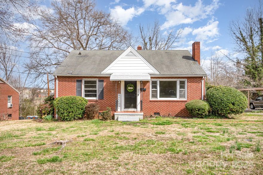 Your next home awaits minutes from the growing downtown of Lancaster, South Carolina. Under $200k this cottage-styled ranch can be yours. This home has so much potential for an investment opportunity for the expansion coming to the South. First home, or long-term investment this large 3-bedroom home awaits your magic touch with plenty of natural light. Spacious updated kitchen with connecting laundry/utility room and spacious basement for storage.  Easy access to 521, and walking distance to coffee shops, restaurants, and retail shops. Schedule a tour today!