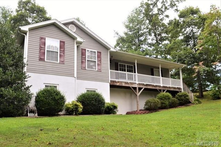 Immaculate 4BR/3BA home in desirable neighborhood in the heart of Rutherford College.  Conveniently located to schools, Valdese Hospital, and I-40.  Covered front porch is perfect for rocking chairs and relaxing evenings.  Beautiful hardwoods throughout living room, kitchen/dining, and hallway.  Spacious living room has large windows, allowing abundant natural light.  Split bedroom design.  Large master suite features walk-in closet and ensuite bath with double vanity, shower/tub combination.  Three additional bedrooms on main level, each with large closets and full bath.  Full finished basement has a great family room and full bath with walk-in shower.  Workshop and utility room provides wonderful storage space.  Huge outbuilding offers great space for tools and lawn equipment.  Duke Energy, Rutherford College water/sewer.  Rutherford College Elementary, Heritage, Draughn.