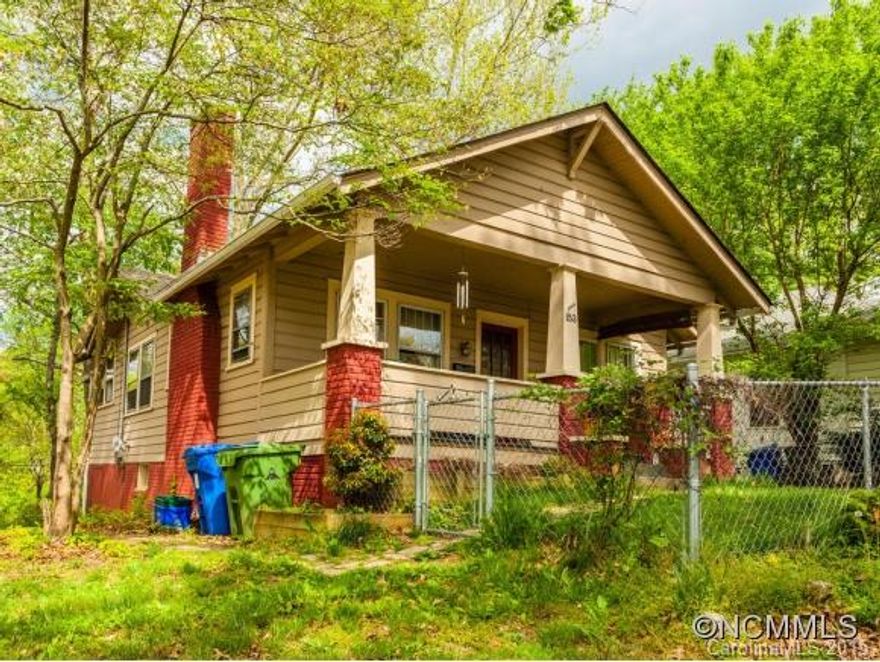 East West Asheville Bungalow on sizable corner lot w/shady oak trees.  Newer roof and gas furnace. Very walkable via sidewalk to Haywood Road.  Basement storage.  Ample off street parking area. Oak hardwood floors, Mudroom off kitchen not counted in sq.ft.  Back deck. Covered front porch. Fenced yard. Tiled bath.