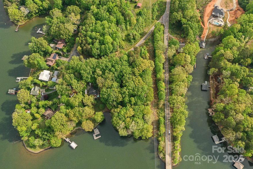 Great opportunity to own on a large vacant lot on Lake Norman! This parcel is approximately 2.58+/- acres of untouched waterfront acreage in the fast growing Sherrills Ford area. With big hardwoods and terrain that slopes gradually down to the shoreline, the land lays out very well and with over 350+/- feet of shoreline, the possibilities are endless!