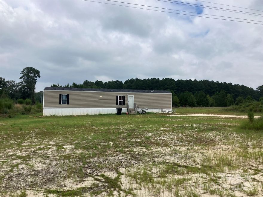 Investment opportunity
14 acres Mobile Home Estates.

Eight pads are occupied by tenant owned homes

Three pads are available for Lot Rent or You Can Pl., Mobile Homes to increase gross income also has potential to increase lot rent to increase gross income. What separates this property from other properties is the lots are approximately 1 acre selling 14 acres

Option 2 
Purchase approximately 5 acres one current tenant / tenant owned home