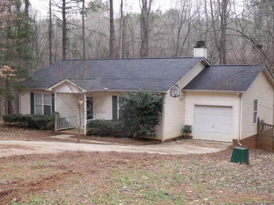 Ranch home nestled on a large lot. 3 bedroom, 2 bath.  New carpet and fresh paint.  Large great room features a cathedral ceiling.  Lots of natural light. Large master with private bath.  One of the secondary bedrooms is setup nicely for an in-home office.   Huge deck overlooks fenced backyard with lots of trees for privacy.  Lots of storage space in laundry/garage area.  Great Mooresville location.  Lots of privacy. If you have pets, owner prefers 20 lbs or less.