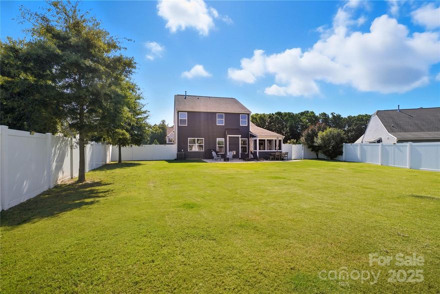 1% lender credit available towards closing costs or rate buy down. This beautifully maintained home blends comfort, style, and energy savings with paid-off solar panels. Featuring 3 bedrooms, 2.5 baths, and a first-floor primary suite, the layout offers both convenience and privacy. Upstairs you’ll find two additional bedrooms and a versatile loft—perfect for a home office, media space, or play area. Enjoy hosting in the formal dining room or gather in the open-concept living room with a cozy fireplace. The kitchen offers a sunny eat-in area and flows seamlessly to a screened porch and extended patio, ideal for indoor-outdoor living. The large fenced yard provides plenty of space for relaxation or recreation. Covington at Lake Norman offers a vibrant community with an outdoor pool, clubhouse, neighborhood events, and boat storage. Just minutes from public lake access and Westport Golf Club, and with easy access to Hwy 16, you’re only 35 minutes from the airport and close to everything Charlotte has to offer.