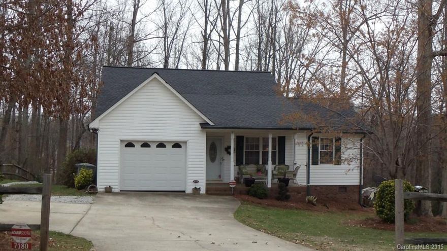 Ranch home on park-like acre in Denver, backing to woods. Relax on the spacious 12x14 deck or the covered rocking chair front porch. Beautiful hardwood floors, 3 bedrooms & two full baths with garden tub in master. Champion sunroom added in 2012 has its own heating/ac unit. Garage has with pebble tec floor and big attic storage above. Highly rated Rock Springs & North Lincoln schools. New roof in 2006. Fridge,washer, dryer, greenhouse & riding mower stay. Home Warranty Included!