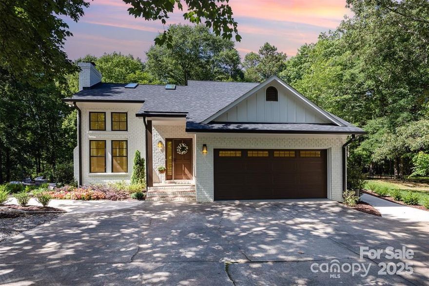 THIS IS A MUST SEE! Elevated living in a country setting with modern touches. This meticulously maintained property is a landscape company owner's personal residence with a manicured lawn, & an abundance of hardscape & softscape to add to the already breathtaking and tranquil views. The updates to this home are plentiful: roof, gutters, hardwood flooring throughout, refinished kitchen cabinets with quartz countertops, updated lighting, brick paver patio, encapsulated crawl space, and so much more! 7 zone irrigation system helps maintain the lawn surrounding the home. The property's natural beauty can be seen from every window in the home. Words cannot do this property justice. Come on out & feel your stresses melt away as you stand in the peace and serenity of this property's beautiful land.