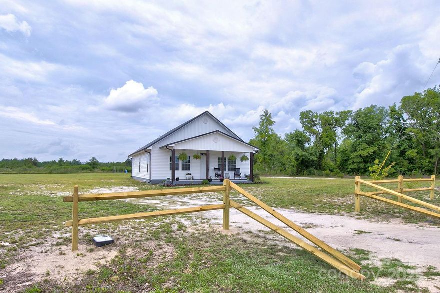 Welcome Home!
This charming bungalow is nestled on 3.34 acres in the peaceful countryside of Kershaw, SC. Featuring three bedrooms and two bathrooms, every detail of this home was thoughtfully designed. Enjoy a custom kitchen with granite countertops, luxury vinyl plank flooring throughout, and a spacious master suite with a beautifully tiled en suite bathroom.

Step outside to your private slice of nature—3.34 acres full of wildlife and serene scenery. Whether you're an avid sportsman, love farming, gardening or simply enjoy the outdoors, this property is the perfect retreat.