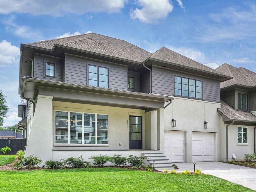 Welcome to 2817 Irby Drive, located in the final phase of the Greenway Townes Development near Freedom Park! Built by McCormick Custom in 2024, this home has it all, and truly lives like a single family residence! The large steel door welcomes you right into this open concept floor plan. Featuring a primary on the main level, with an oversized primary bathroom & closet (w/ laundry hookup), as well as equipped w/ an elevator for access to both floors. Professional grade Sub-Zero/Wolf appliances, custom wood range hood/cabinetry with quartz countertops make the kitchen a chef and entertainer's dream. The second floor features a bonus room w/ wet bar, a dedicated office & three additional bedrooms all with their own en-suite bathroom. Exterior features include a front sitting porch, side yard, in-ground irrigation & landscape lighting. A short distance to all that Freedom Park, Park Road Shopping Center & Selwyn Ave have to offer! Come see what luxury living on the Greenway is all about!