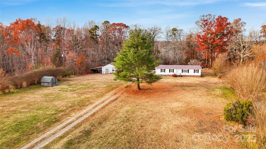 $50,000 price drop!Welcome to this charming 2-bedroom, 2-bath home offering 1,344 sq ft of comfortable living space, perfectly situated on 2.68 acres in a highly desirable location. This property is full of potential—whether you’re looking to update, expand, or simply make it your own, the possibilities are endless.
Inside, you’ll find a functional layout with spacious rooms and plenty of natural light. With a bit of updating, this home could easily be transformed into a modern retreat tailored to your style. The acreage offers privacy, room to grow, and space for outdoor living, gardening, or future additions.
A standout feature of this property is the large outbuilding, ideal for a workshop, hobby space, storage, or even a future studio. Whether you’re a DIY enthusiast or need extra space for projects, this building adds incredible versatility.
Don’t miss this rare opportunity to own acreage in a prime location with so much potential. Bring your vision and make this property truly exceptional!