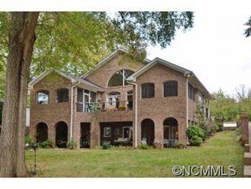 Lanier Lake Cottage portrays what traits  a lake home should be!  A family home, a retreat, a secure homestead and above all an enjoyable place to sit, relax and ponder life's next moments while staring out onto peaceful Lake Bowen. Home feature solid brick construction, master on main,  2 bedroom and efficiency kit on lower level. Deep water lake access, dock, double car garage, screened decks and beautiful setting. Priced competitively!