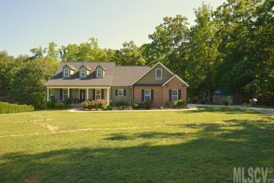 A rare find! Nearly new custom built home is sitting pretty on 4.89 acres in Dudley Shoals. Pastoral and wooded view. This 4 bedroom home has beautiful oak hardwood flooring in all rooms except the 3 bathrooms which have ceramic tile flooring. The custom kitchen has granite countertops, gorgeous raised panel maple cabinetry, and an eating bar. The living room offers a gas log fireplace and cathedral ceiling. Enjoy spending time on the 300 ft. screened-in porch overlooking a large lawn and private woods. The bonus room on the 2nd floors provides another media/office/den option for the family. There's also a floored storage area upstairs. Land lays really well, and has a small creek behind the house in the wooded area. There are two 46.50 gallon water heaters supplying plenty of hot water for a large family. The garage is oversized and there's also a large wired outbuilding. Don't miss out!